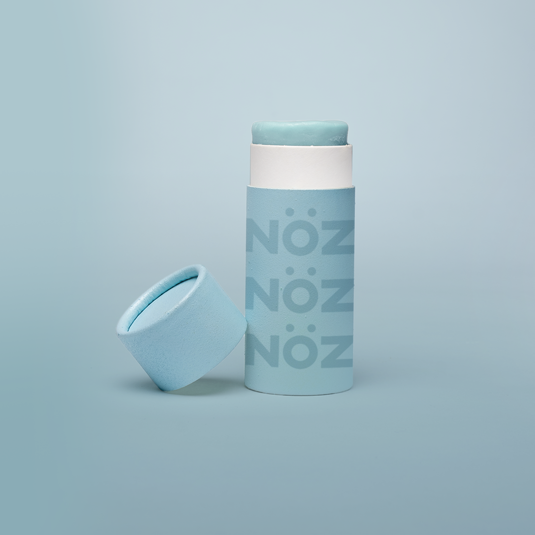 Zoomed in view of opened Nöz light Blue eco-friendly Sunscreen 