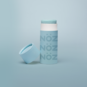 Zoomed in view of opened Nöz light Blue eco-friendly Sunscreen 