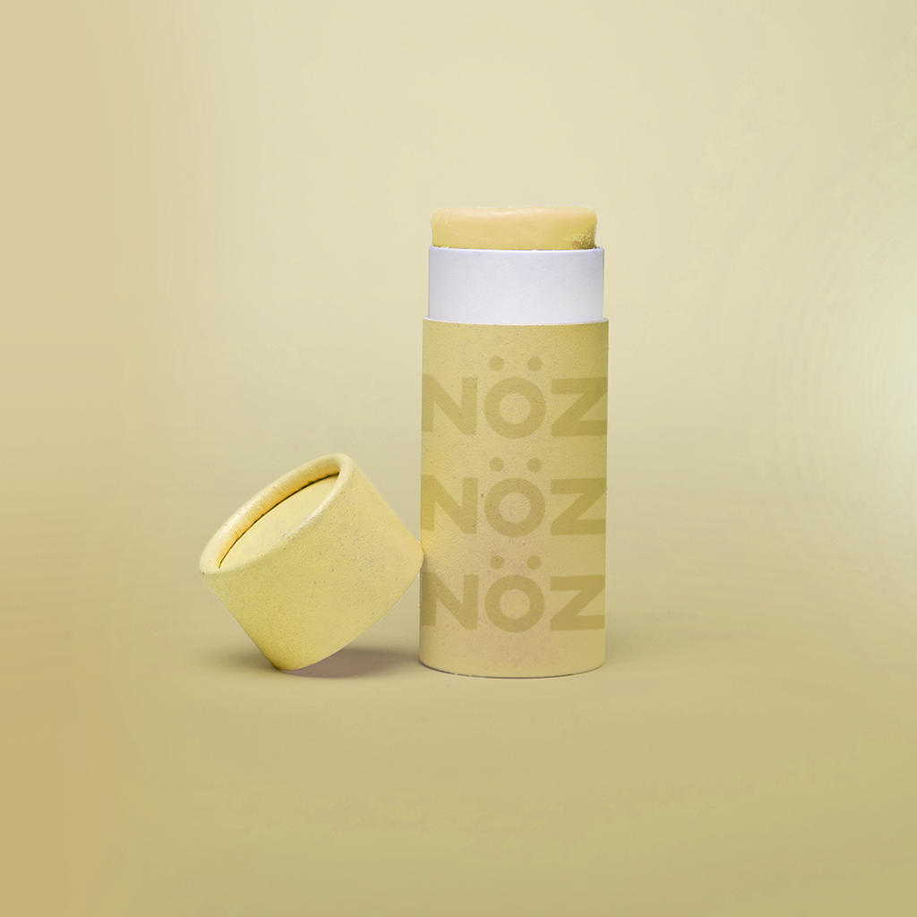 Zoomed in view of opened Nöz sunny yellow reef safe Sunscreen